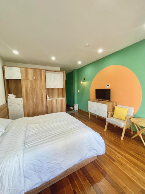 Postel nebo postele na pokoji v ubytování POTA Hotel & Apartment