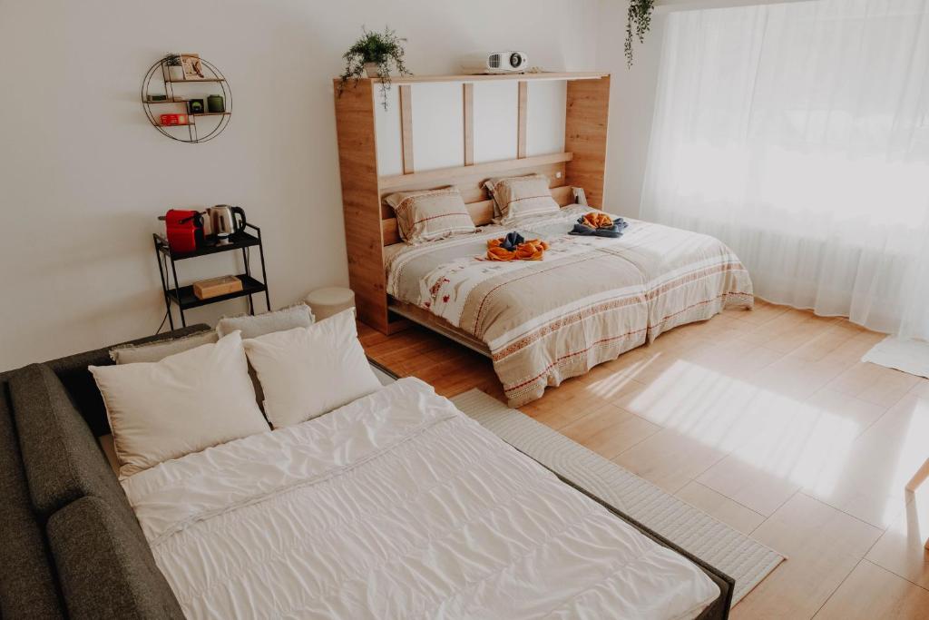 Postel nebo postele na pokoji v ubytování Superb Modern Studio Leukerbad