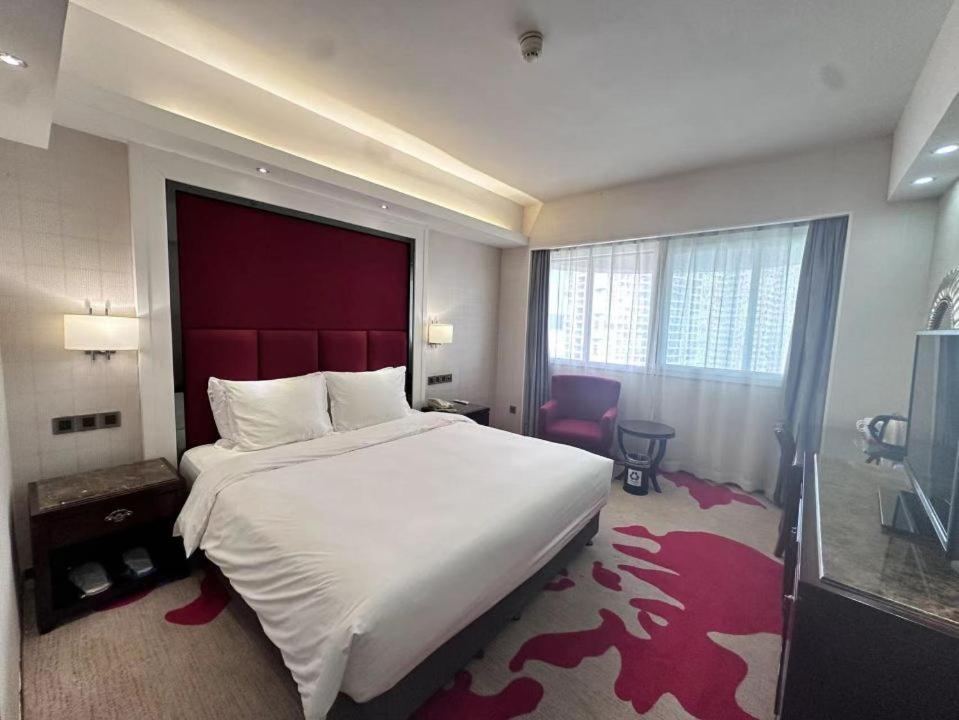 Postel nebo postele na pokoji v ubytování Holiday Inn Express Xiamen Lushan -Shopping Center by IHG