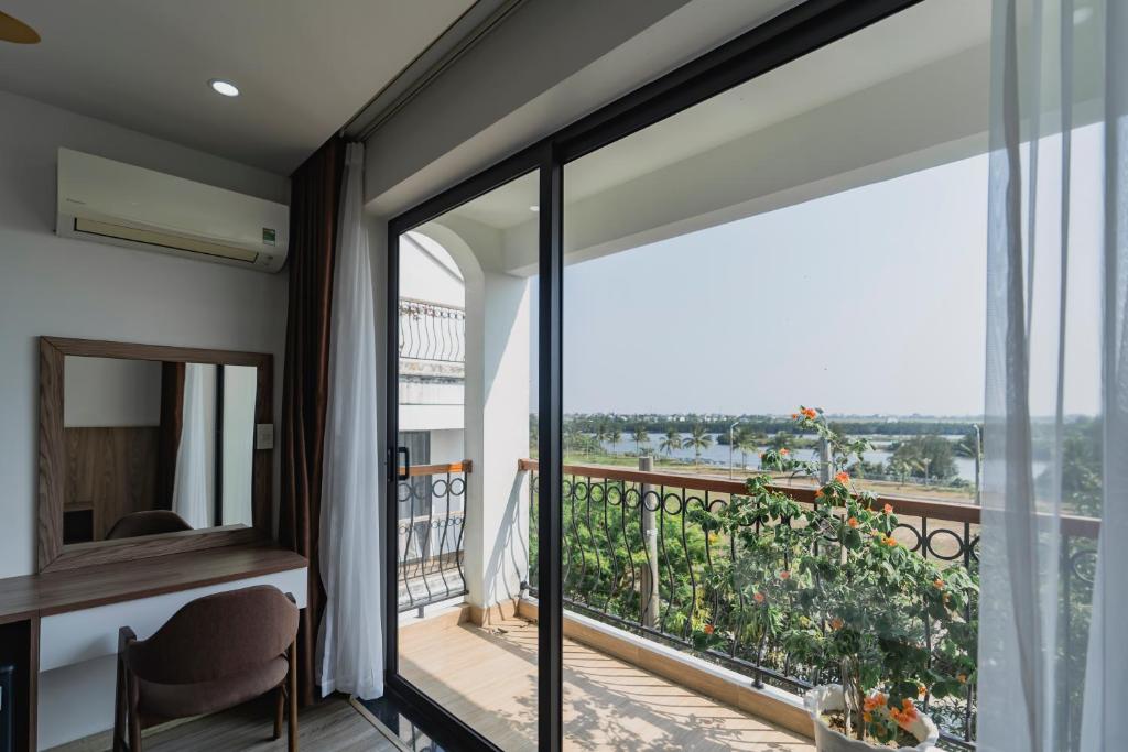 Balkón nebo terasa v ubytování 1 Stop ViVi An Bang Beach Hoi An Hotel