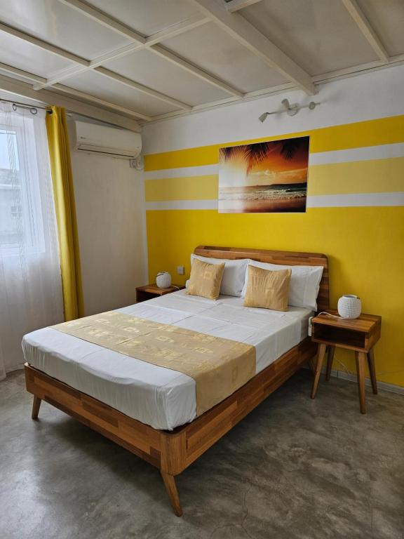 Postel nebo postele na pokoji v ubytování Casa Frangipani Mauritius