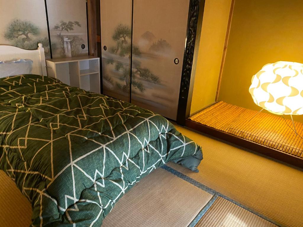 Postel nebo postele na pokoji v ubytování One Room in Pusang Gala