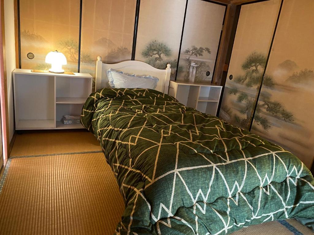 Postel nebo postele na pokoji v ubytování One Room in Pusang Gala