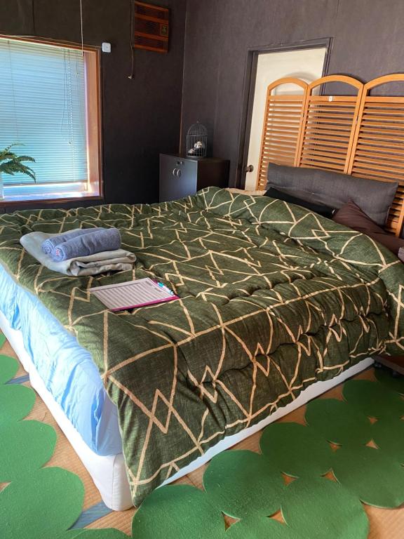 Postel nebo postele na pokoji v ubytování One Room in Pusang Gala