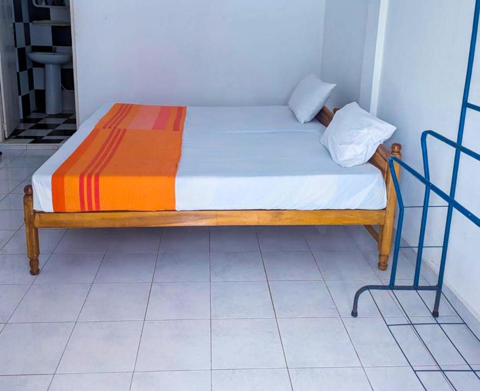 Postel nebo postele na pokoji v ubytování Sunflower Inn