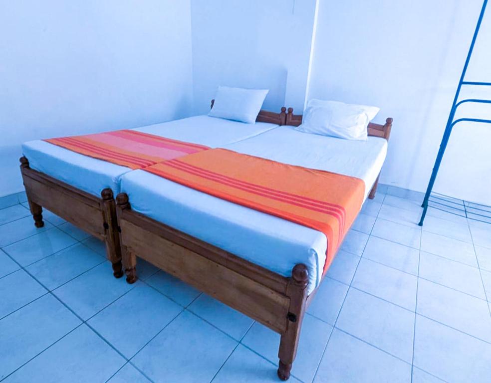 Postel nebo postele na pokoji v ubytování Sunflower Inn