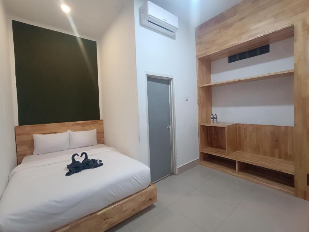 Postel nebo postele na pokoji v ubytování D'Hills Hotel