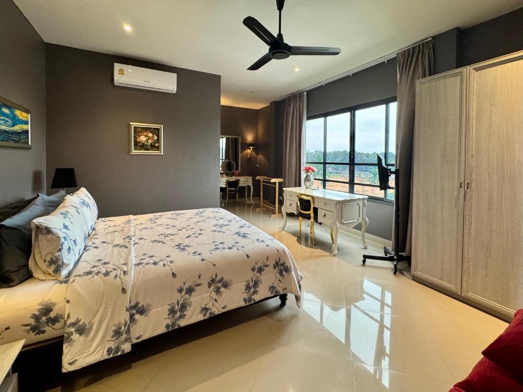 Кровать или кровати в номере Klong Muang Beach Apartment