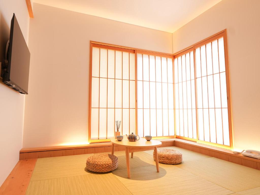 TV a/nebo společenská místnost v ubytování 大日寺の宿 京都吉祥院