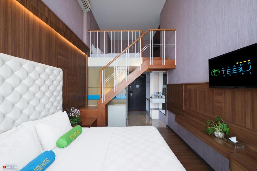 Grand Tebu Hotel - Duplex Quadruple Room
