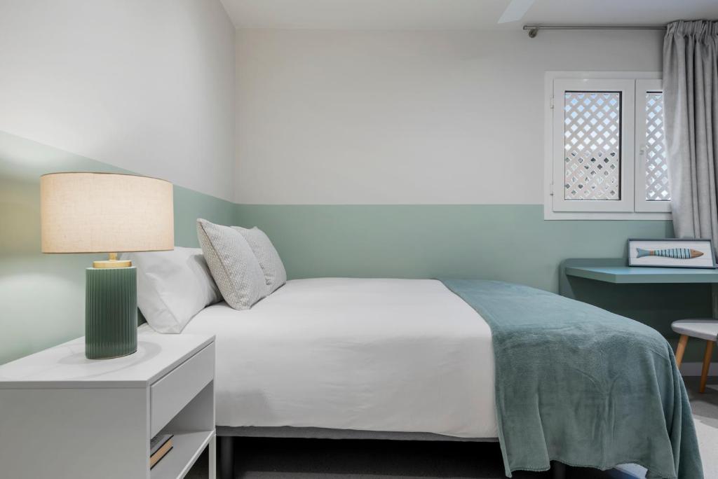 Postel nebo postele na pokoji v ubytování Espacioso y encantador apartamento en las gaviotas