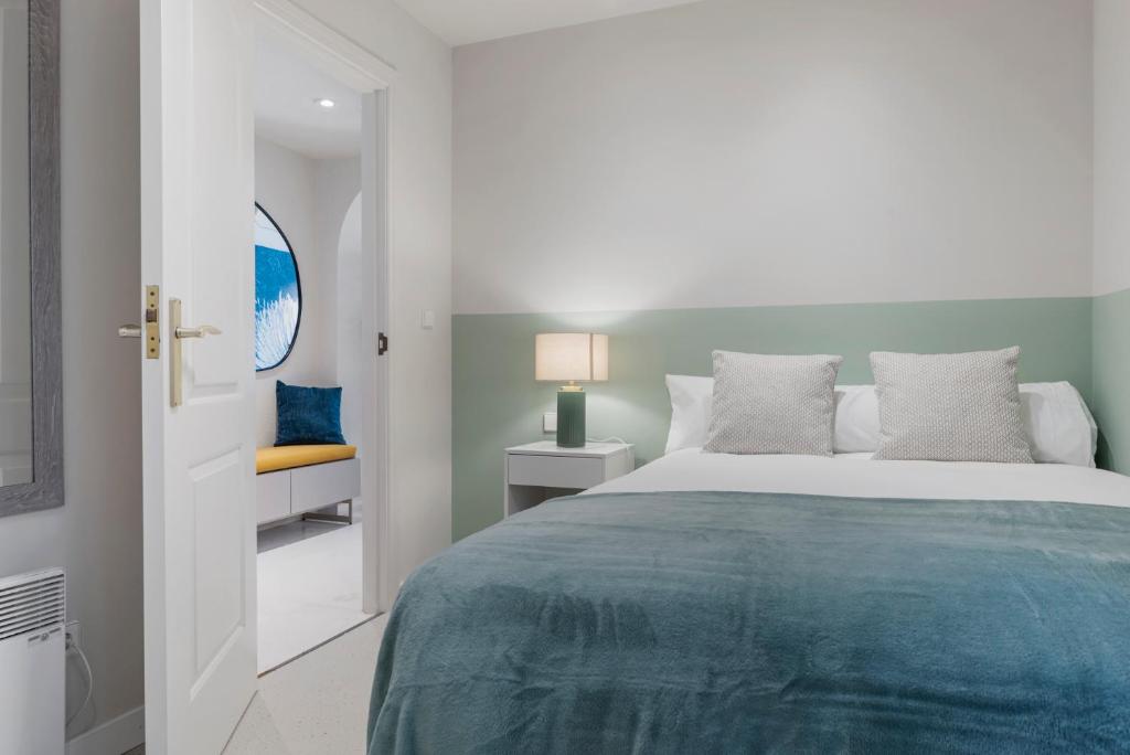 Postel nebo postele na pokoji v ubytování Espacioso y encantador apartamento en las gaviotas