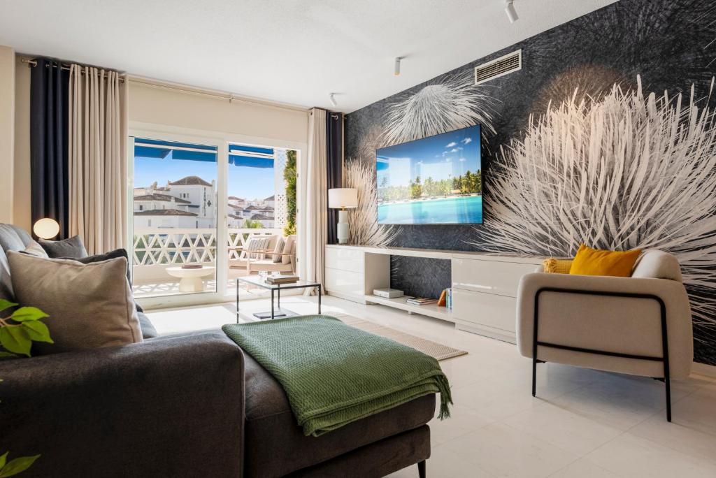 Posezení v ubytování Espacioso y encantador apartamento en las gaviotas