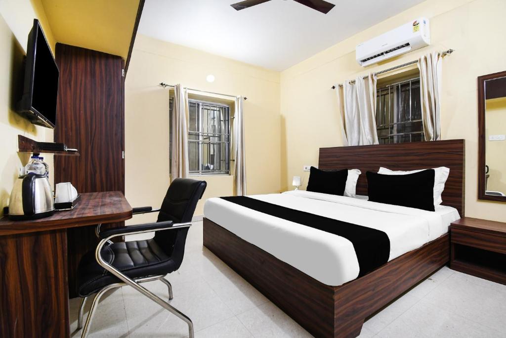 TV a/nebo společenská místnost v ubytování Super Hotel O Indira Park Road Bhubaneswar