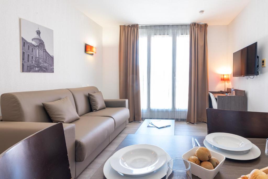 Posezení v ubytování Comfort Aparthotel Nimes Centre