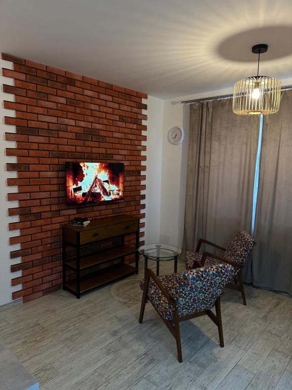 TV a/nebo společenská místnost v ubytování Apartament Orla