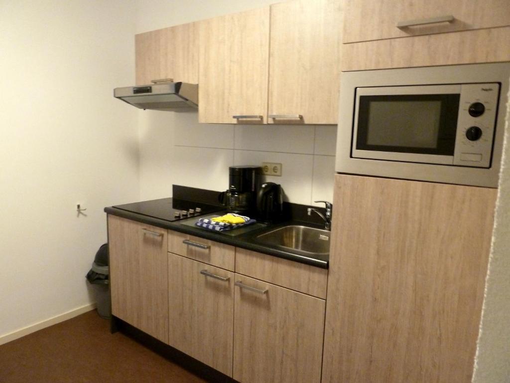 Köök või kööginurk majutusasutuses Nicolette Apartments