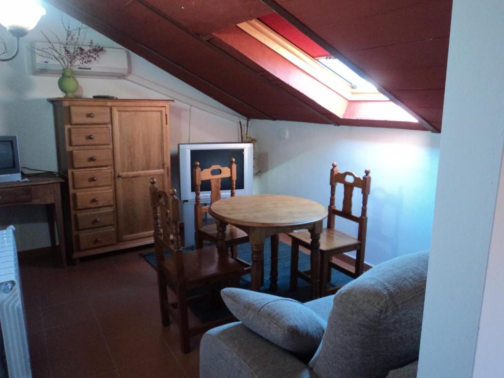 TV a/nebo společenská místnost v ubytování Hotel San Julian