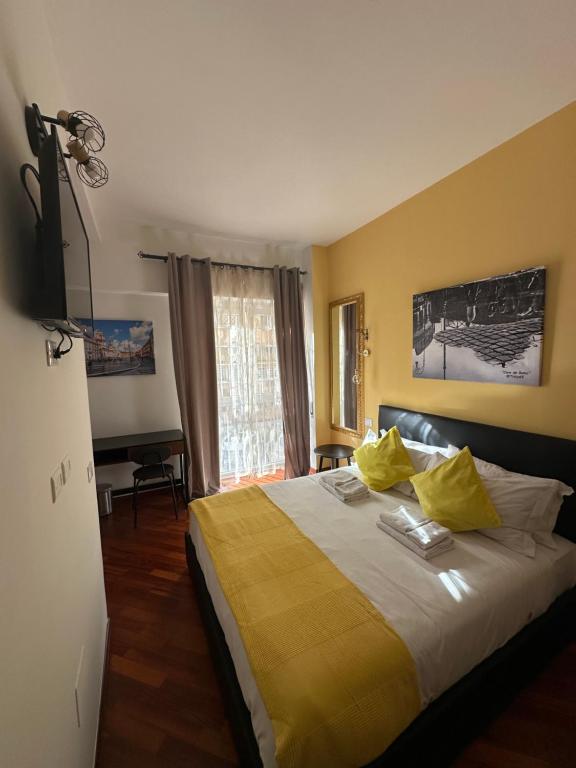 Voodi või voodid majutusasutuse Vatican QG Rooms toas