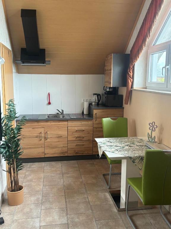 Kuchyň nebo kuchyňský kout v ubytování Apartment in Stauseenähe