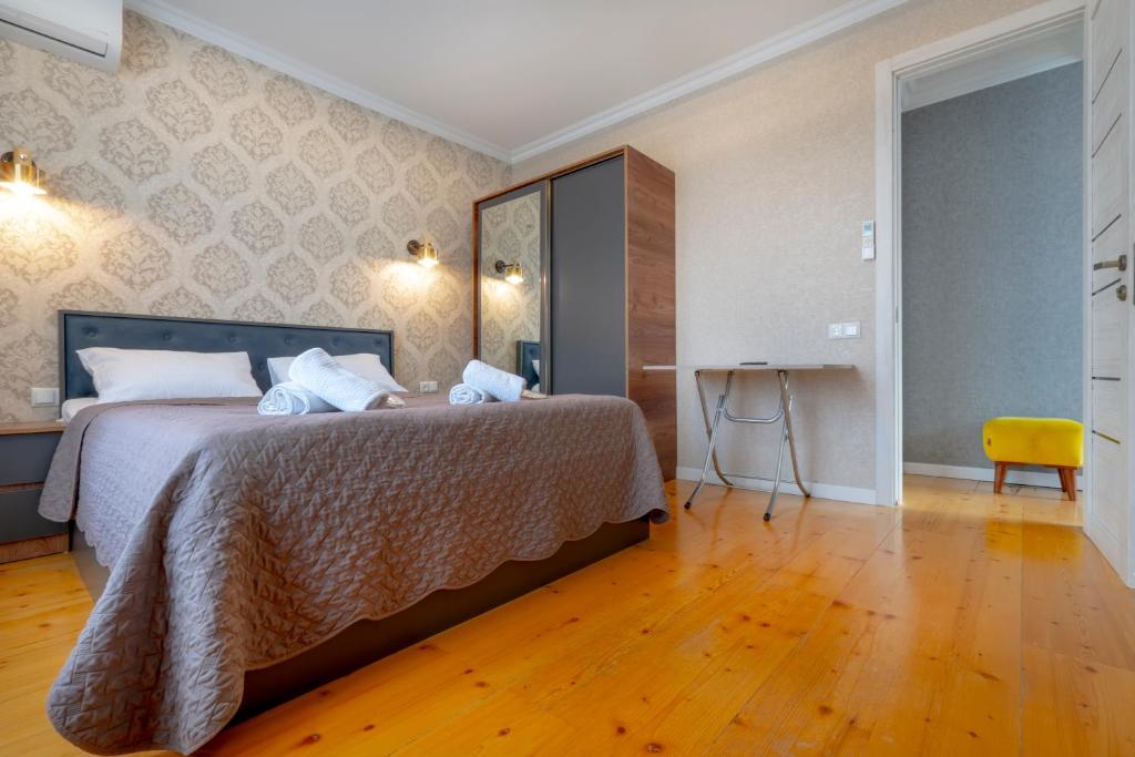 Postel nebo postele na pokoji v ubytování 4Season Villa