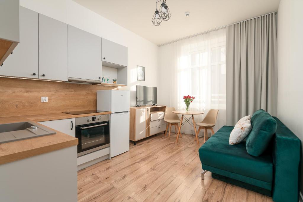 Kuchyň nebo kuchyňský kout v ubytování Chill4You Apartments