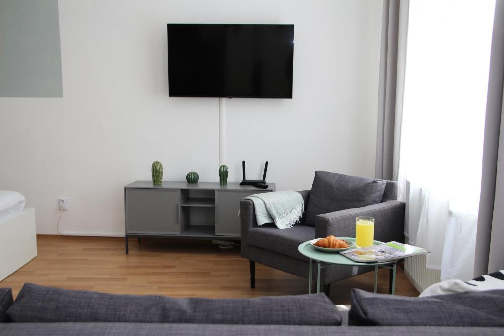 TV o dispositivi per l'intrattenimento presso 7nights Apartments Dominikánské naměstí