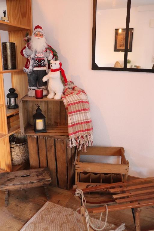 Posezení v ubytování Le Chalet de la Rivière