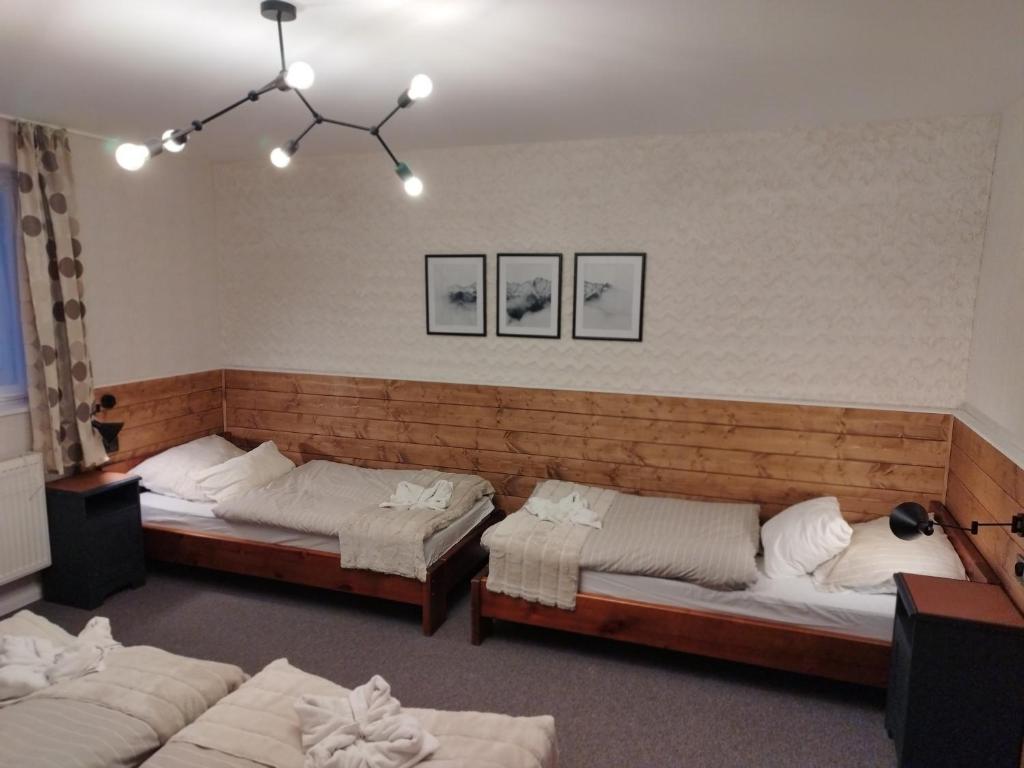 Postel nebo postele na pokoji v ubytování Propaganda Chalet