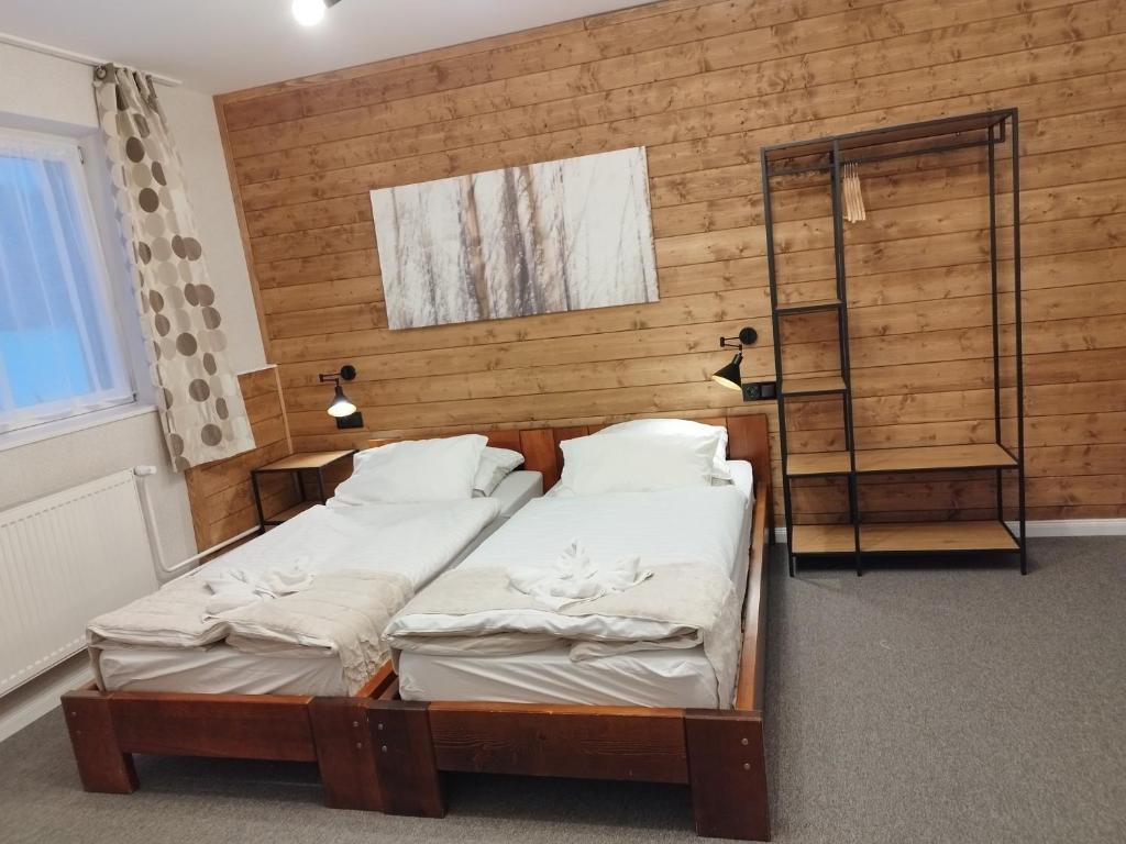 Postel nebo postele na pokoji v ubytování Propaganda Chalet