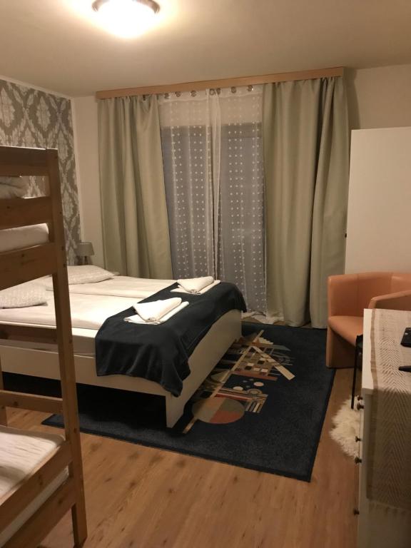 Postel nebo postele na pokoji v ubytování Tannenhof