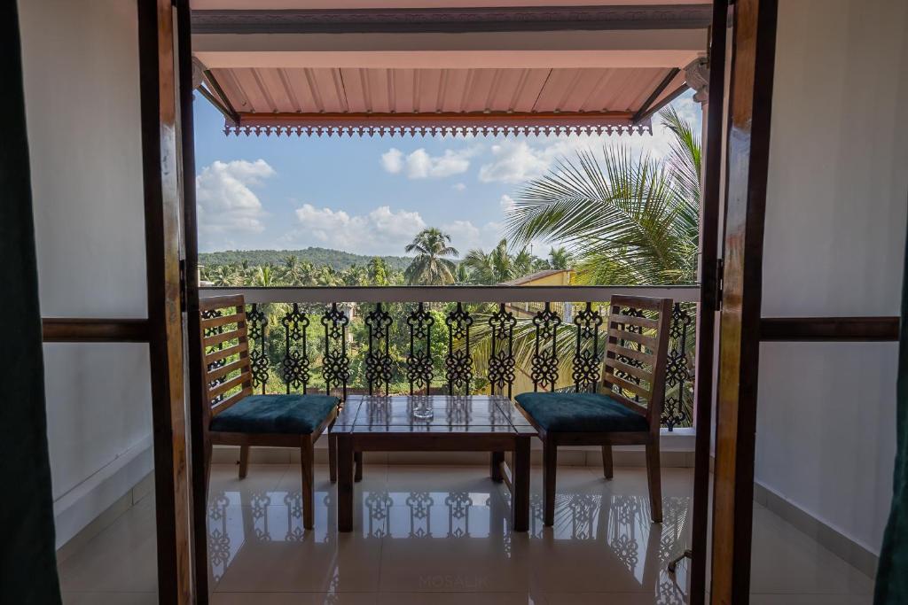 Balkón nebo terasa v ubytování Broad Bean Royal Resort Goa