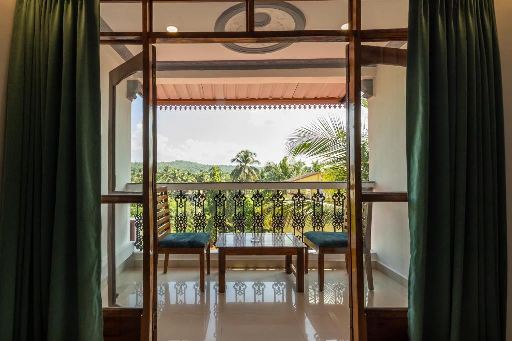 Balkón nebo terasa v ubytování Broad Bean Royal Resort Goa