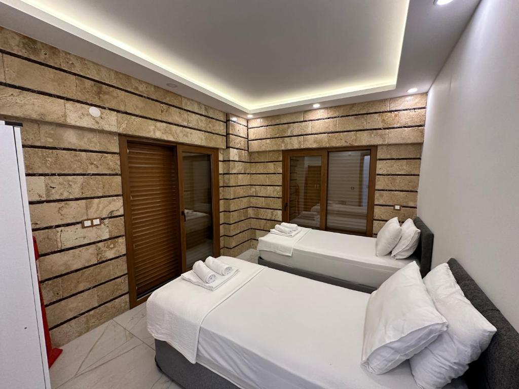 Postel nebo postele na pokoji v ubytování Kuşadası Deniz Tatil Evleri
