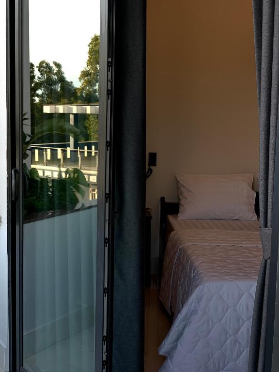 Postel nebo postele na pokoji v ubytování 2001 Motel