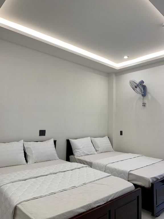 Postel nebo postele na pokoji v ubytování 2001 Motel