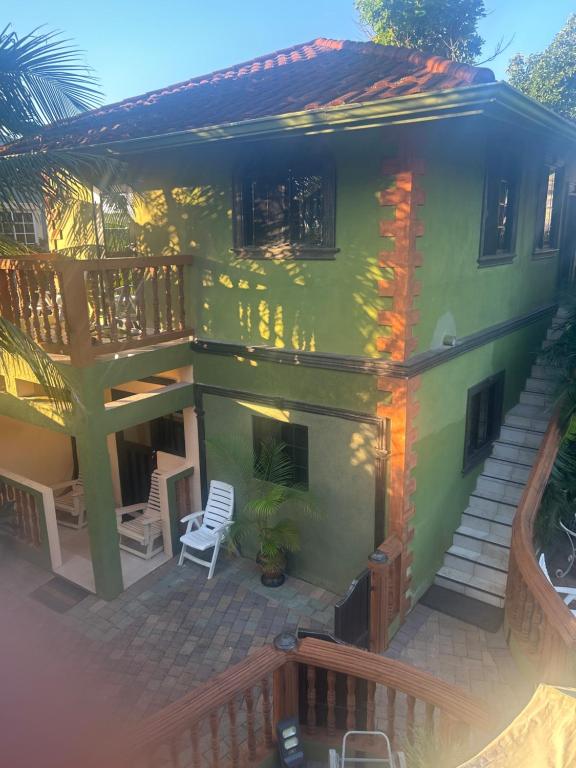 an aerial view of a house with a patio at Hidden oasis in Mandeville
