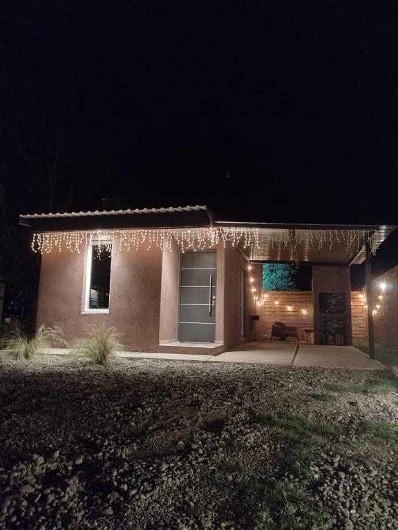 a house with lights in front of it at night at Casa Lorvic 2 in Malargüe
