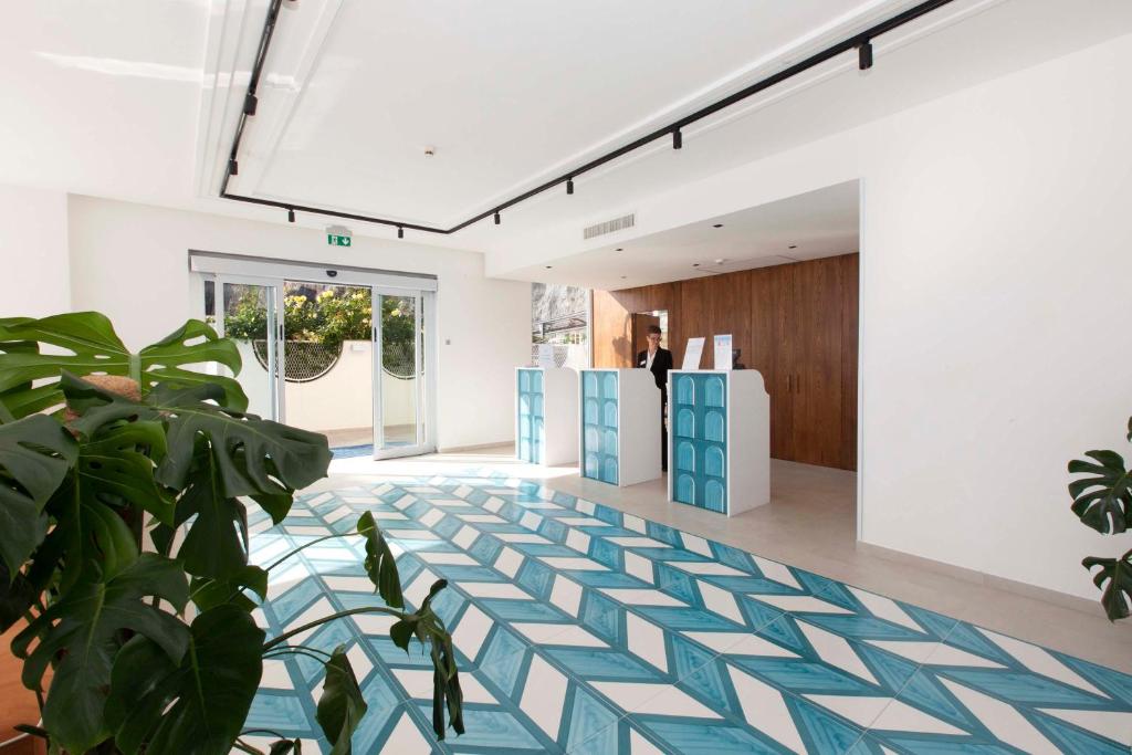 Vstupní hala nebo recepce v ubytování Hotel Admiral