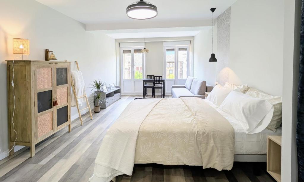 Ένα ή περισσότερα κρεβάτια σε δωμάτιο στο Apartamento Muan