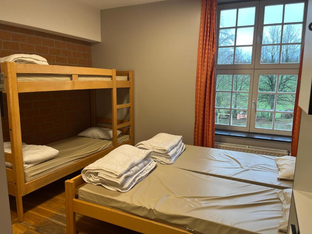 Postel nebo postele na pokoji v ubytování Gîte Kaleo Wanne