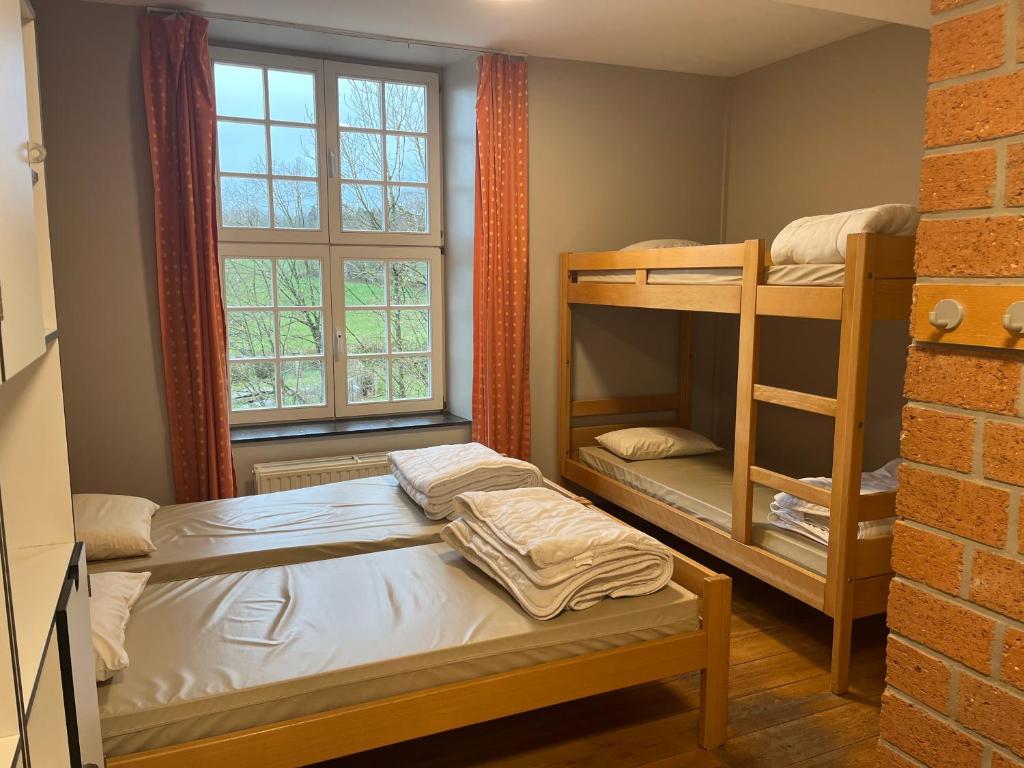 Postel nebo postele na pokoji v ubytování Gîte Kaleo Wanne