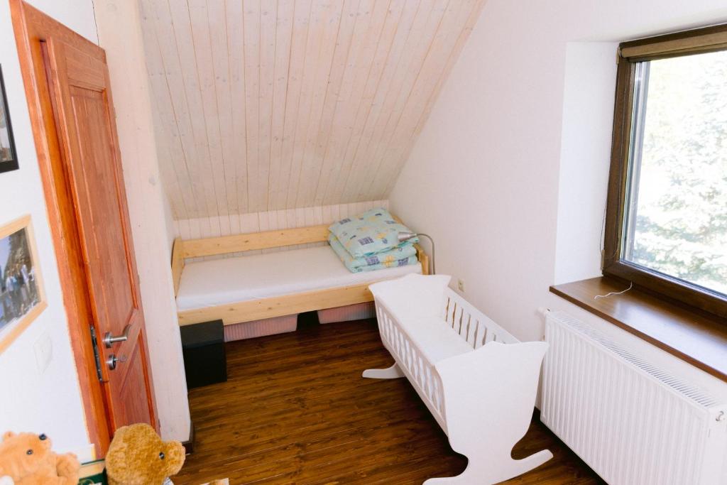 Postel nebo postele na pokoji v ubytování Rodinná chata Makov - Čierne