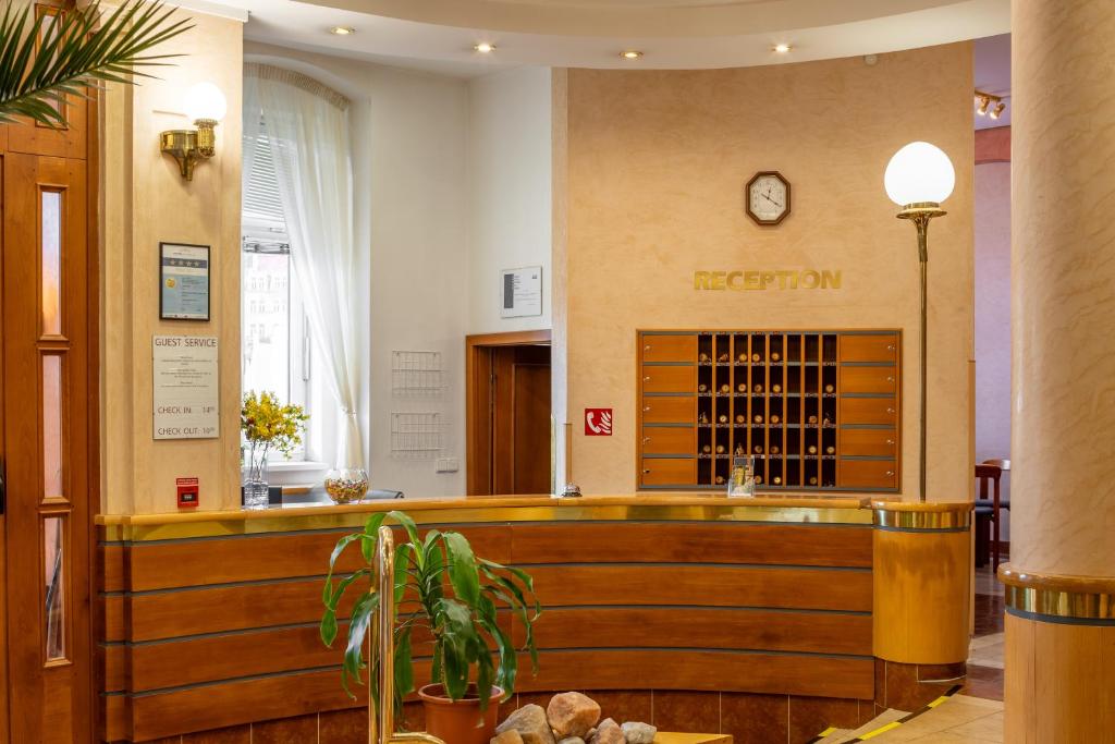 Лобби или стойка регистрации в Wellness Hotel Jean De Carro
