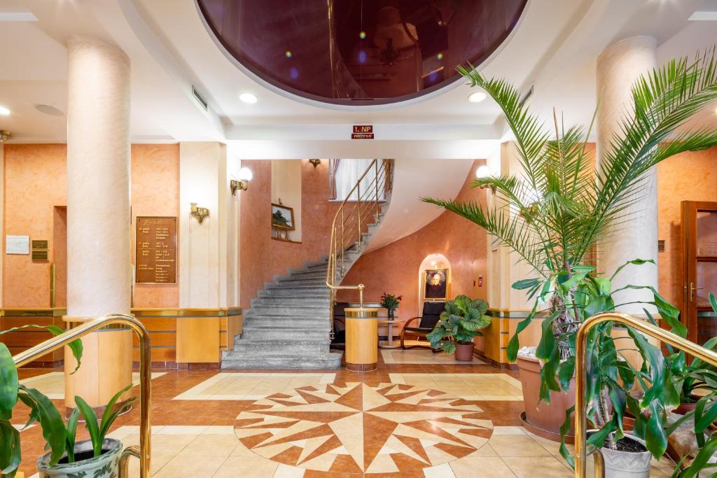 Лобби или стойка регистрации в Wellness Hotel Jean De Carro