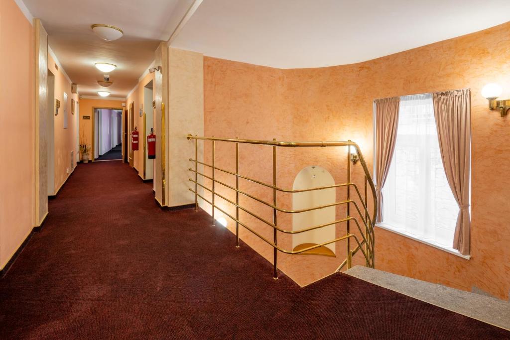 Кровать или кровати в номере Wellness Hotel Jean De Carro