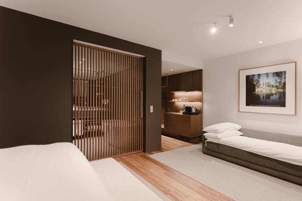 Postel nebo postele na pokoji v ubytování BoHo Hotel Budapest - Small Luxury Hotels