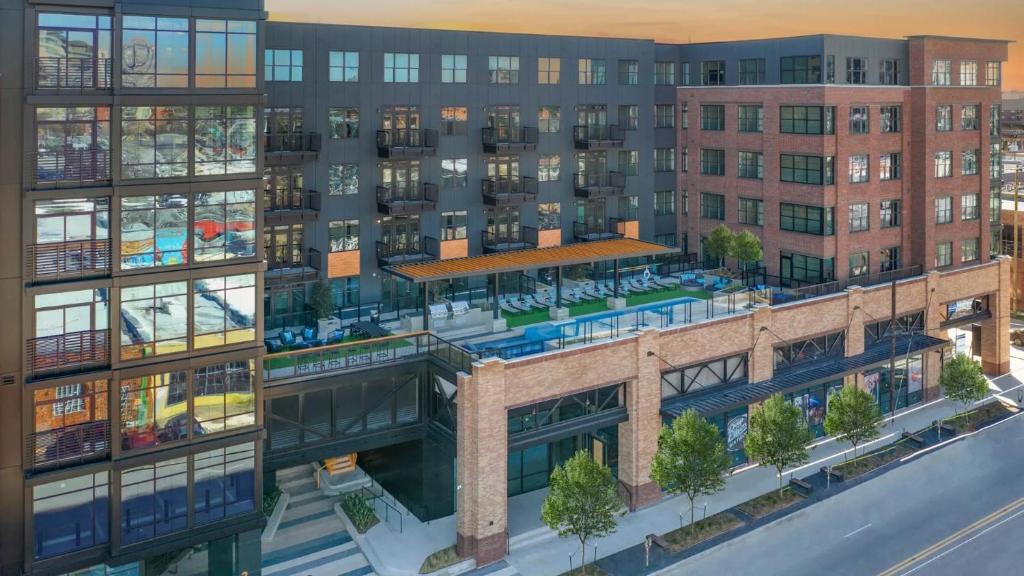 an artist rendering of the planned redevelopment of a building at Indie Deep Ellum in Dallas in Dallas