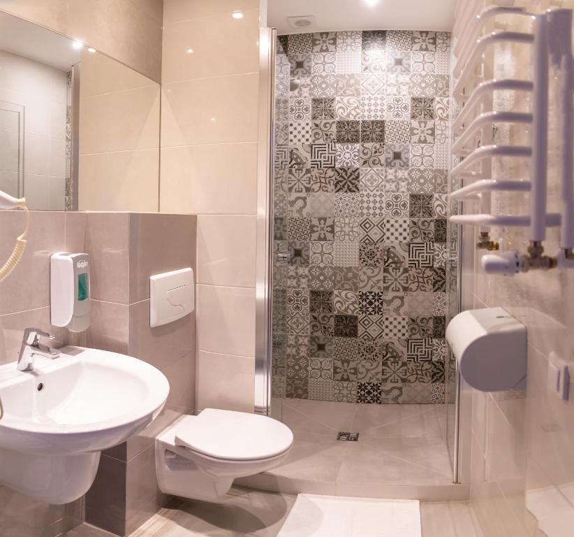 Kúpeľňa v ubytovaní POŁONINY Resort