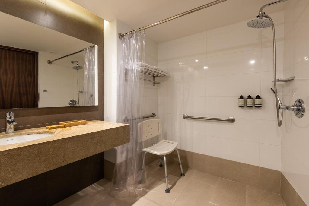 Ванная комната в Hotel Estelar Milla De Oro